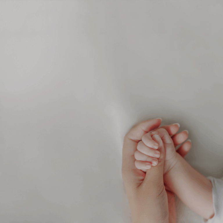 baby and mom hands